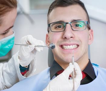 Virginia Biological Dentistry explains partial dentures and fixed dental bridges